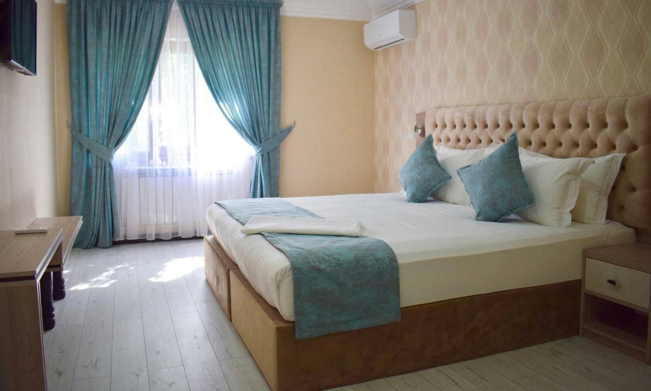 Dostar Inn Șîmkent Exterior foto